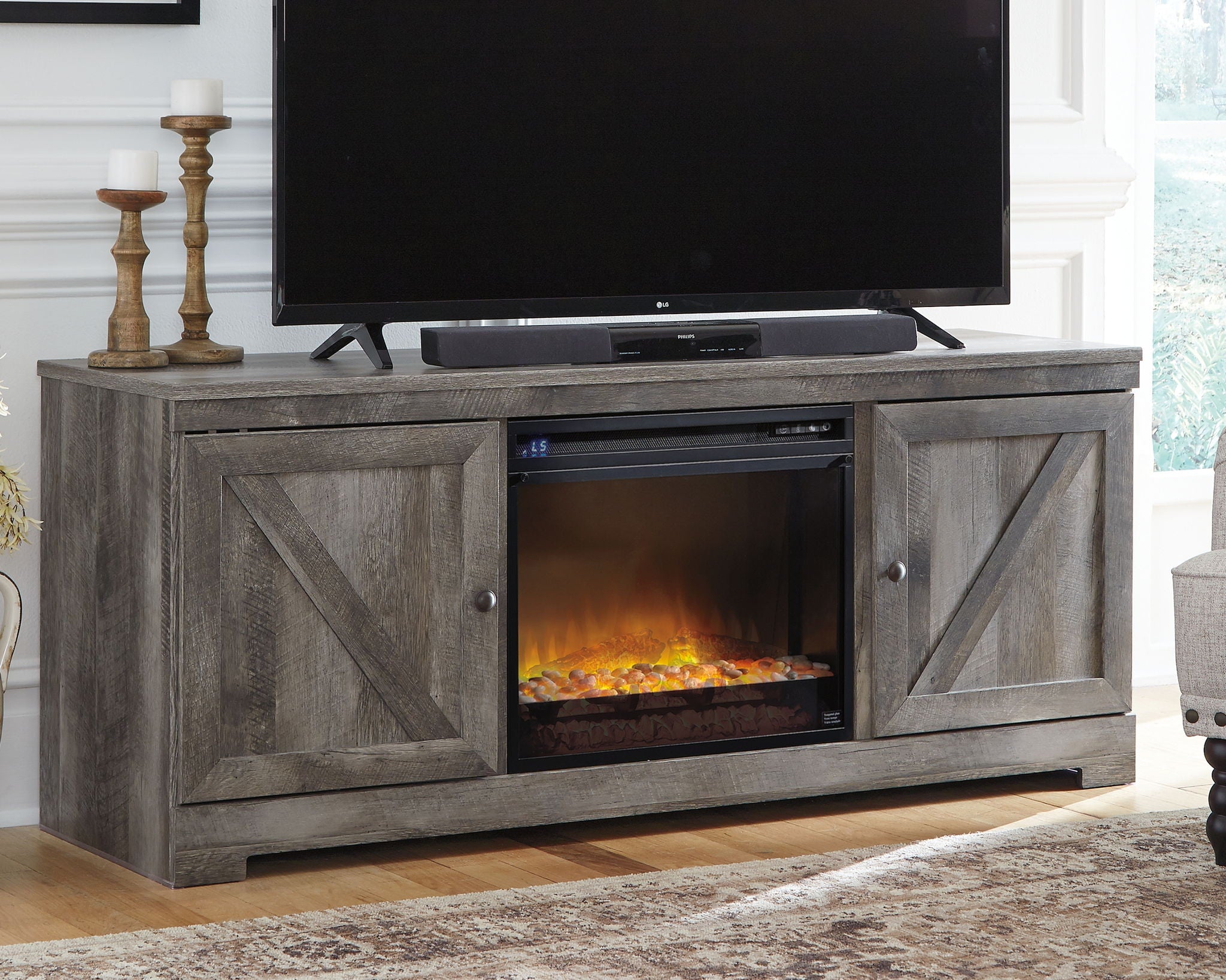 Wynnlow - 63" TV Stand With Glass/Stone Fireplace Insert - Gray